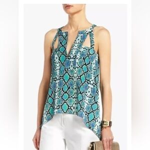 BCBG Maxazria Sleeveless Snake Print Blouse
Split Neck Size XS Green/ Black